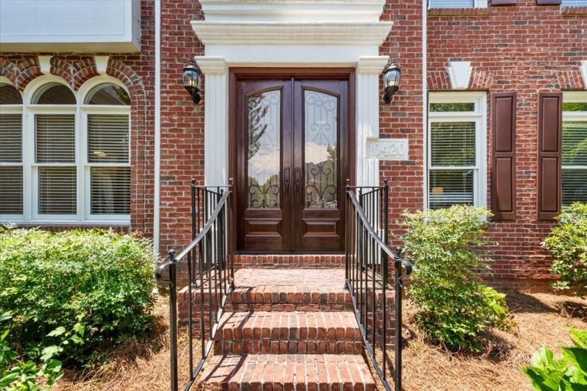 Welcome home to this stunning brick traditional nestled in the - photo 8