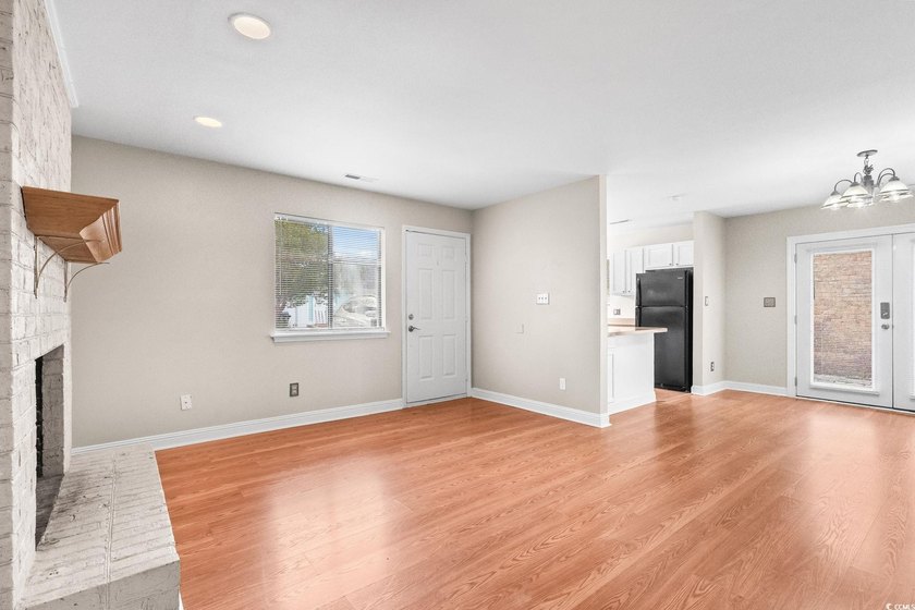 This charming three-bedroom, two-bathroom patio home is located - photo 6