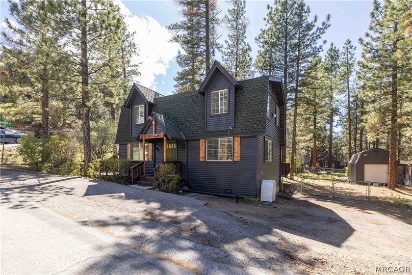 Income averaging $5k monthly this home is -Tucked against a - photo 2