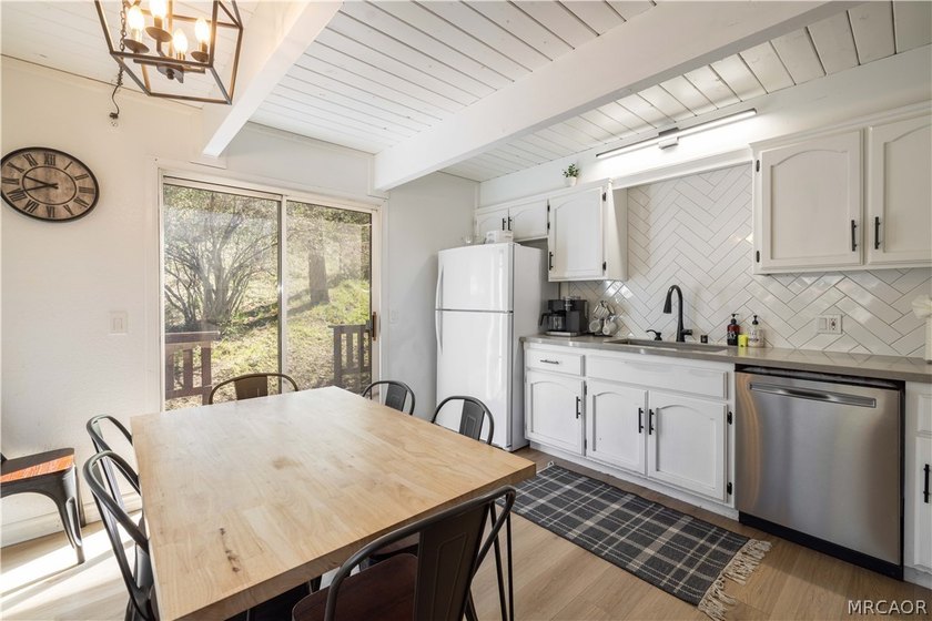 Income averaging $5k monthly this home is -Tucked against a - photo 6