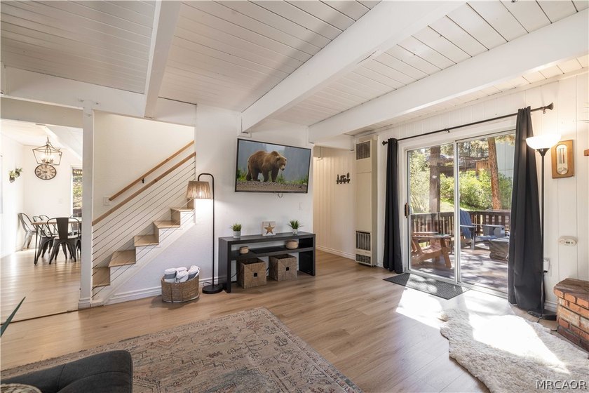 Income averaging $5k monthly this home is -Tucked against a - photo 9