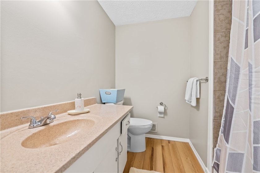 Updated 3 bedroom and 1.5 bath ranch offering the ease and - photo 17