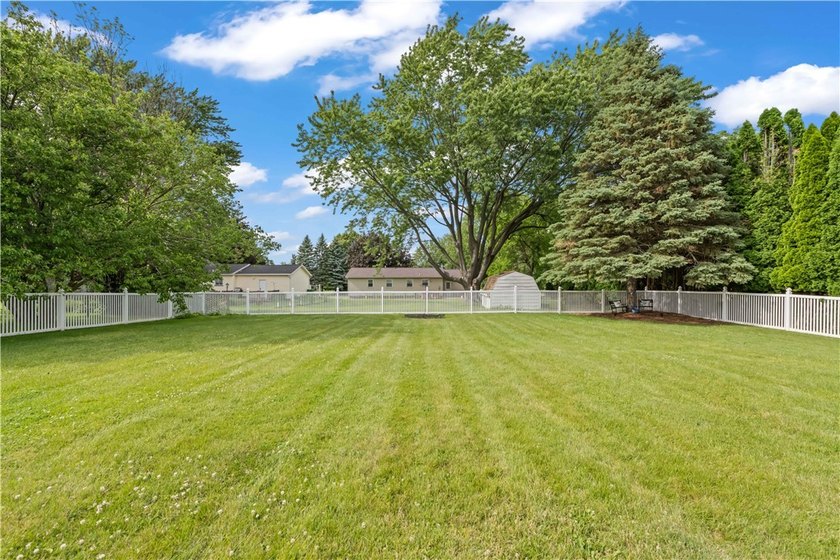 Updated 3 bedroom and 1.5 bath ranch offering the ease and - photo 19