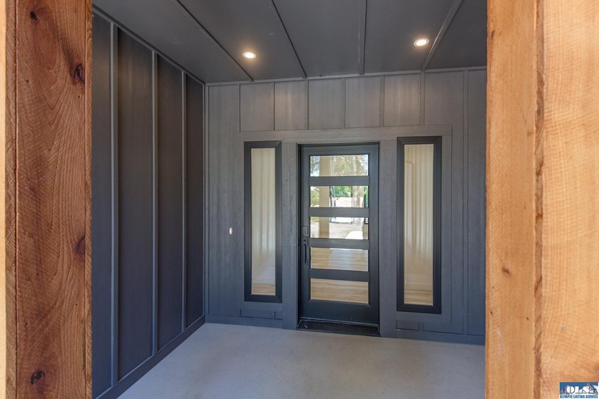 Welcome home to this beautifully designed newly constructed - photo 3