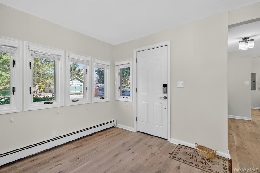 Experience the magic of lake living! Beautifully maintained home - photo 6