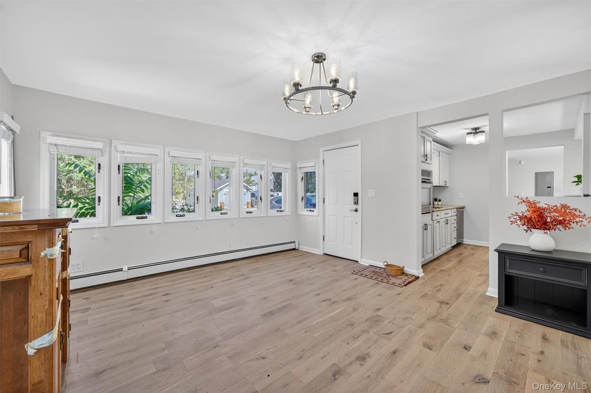Experience the magic of lake living! Beautifully maintained home - photo 7