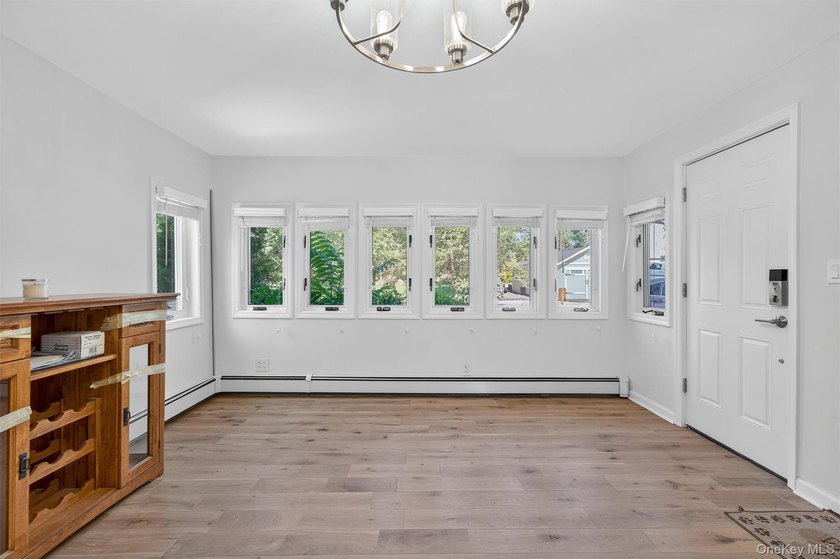 Experience the magic of lake living! Beautifully maintained home - photo 8