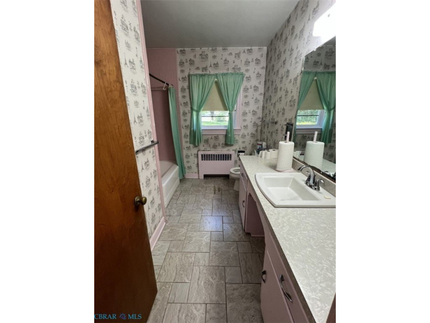 Classic Urbanna brick rancher located just a short walk away - photo 4