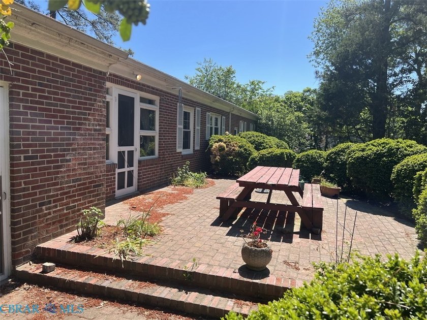 Classic Urbanna brick rancher located just a short walk away - photo 6