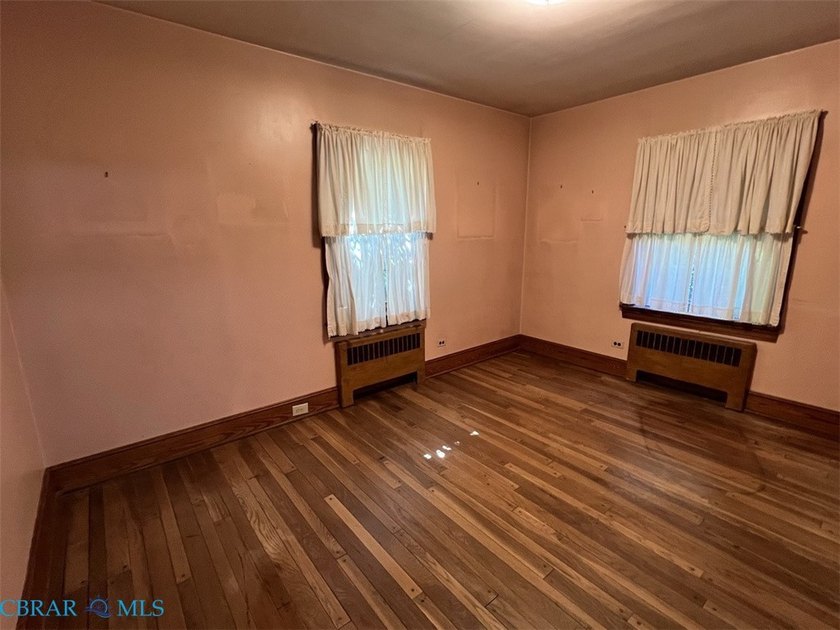 Classic Urbanna brick rancher located just a short walk away - photo 8