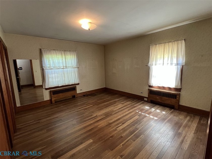 Classic Urbanna brick rancher located just a short walk away - photo 9