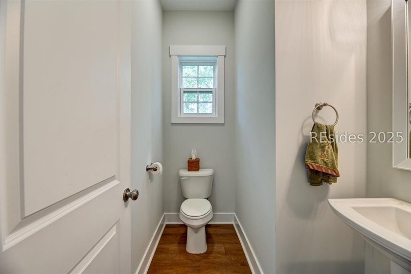 Discover the perfect blend of Lowcountry charm in a prime - photo 9