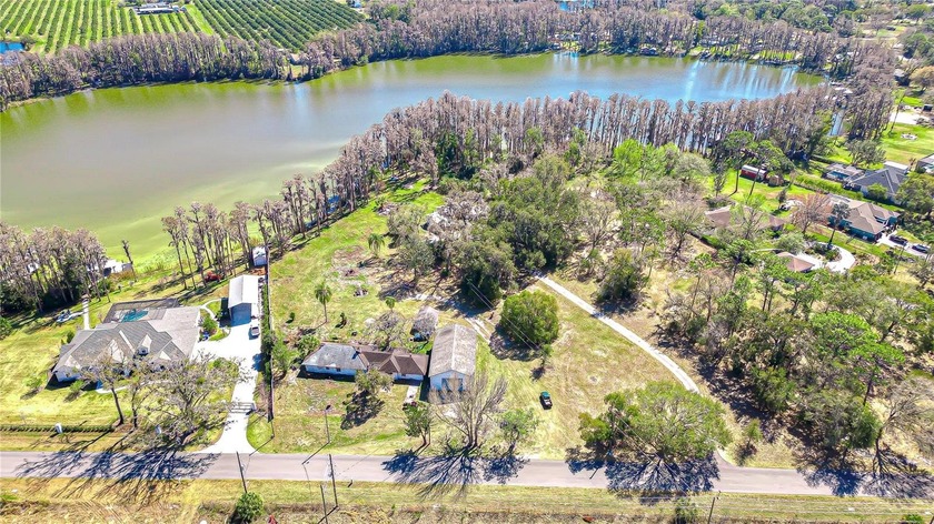 Opportunity to own 3 private acres on beautiful Wisteria Lake in - photo 11