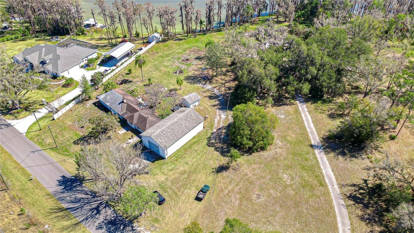 Opportunity to own 3 private acres on beautiful Wisteria Lake in - photo 15