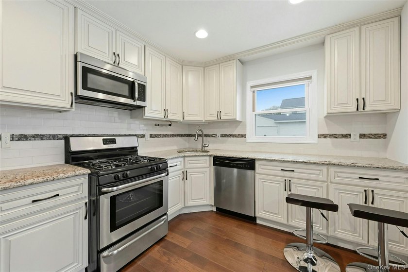 Perfection awaits in this 2 bed 1 bath 730 sq ft Ranch with an - photo 2