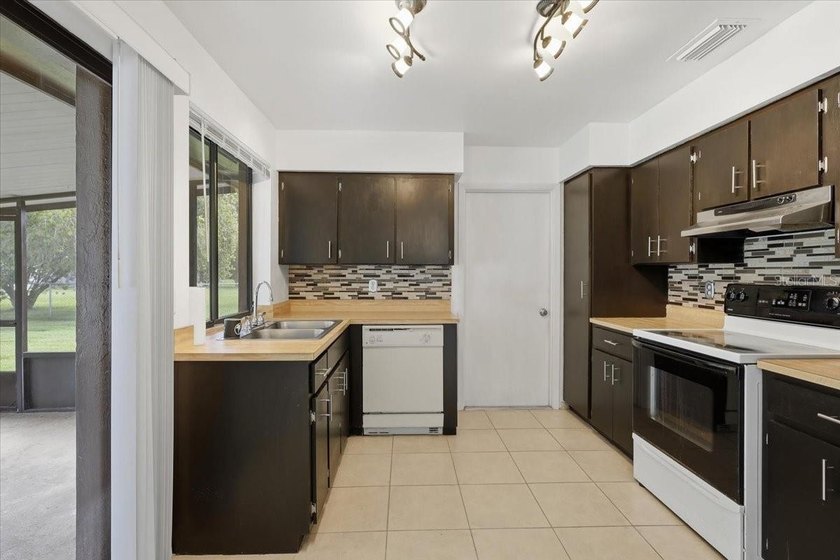 Welcome home to 10 Fenwick Lane, a charming starter home or - photo 11