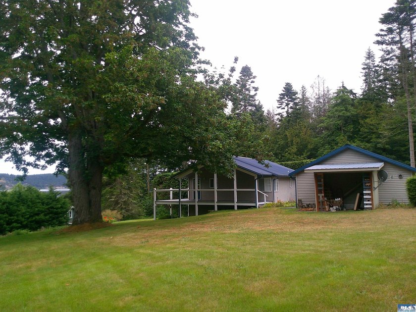 Beautifully landscaped acreage with views overlooking Discovery - photo 5