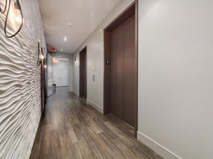 Step into elevated city living with this exceptional full-floor - photo 3