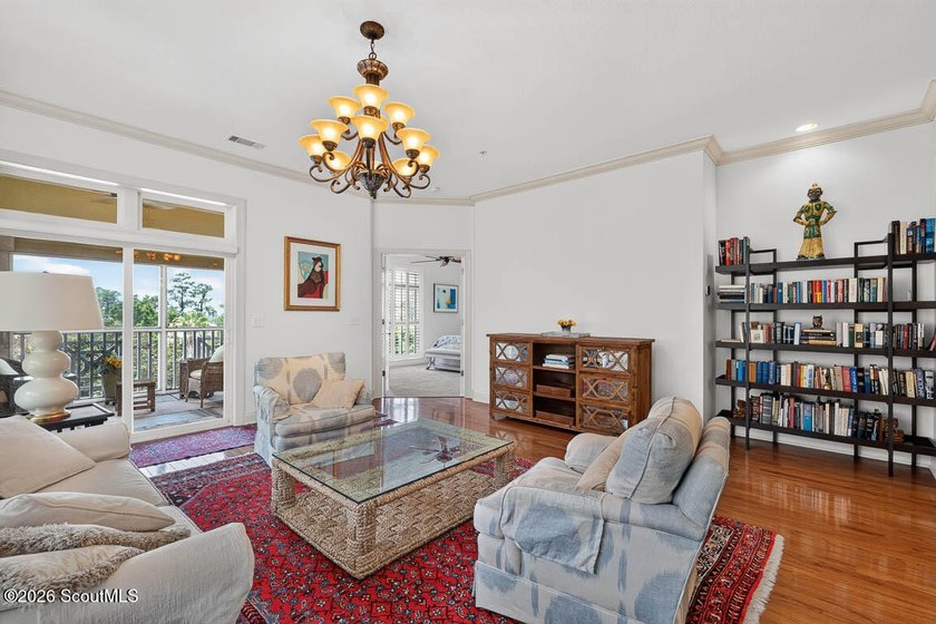 A rare opportunity to own a top-floor, rear corner residence in - photo 6