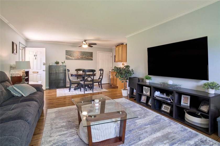 Welcome home to this bright and inviting remodeled 1st floor - photo 2