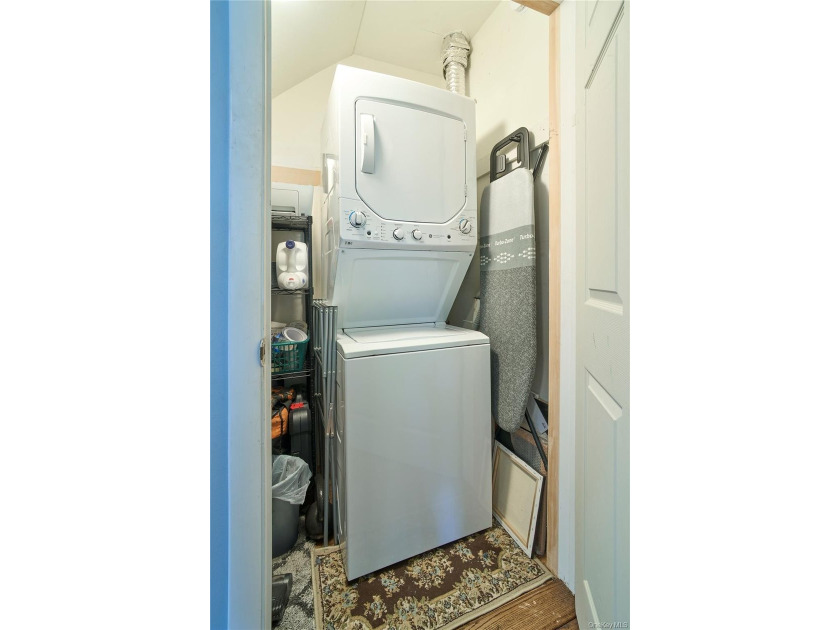 Welcome home to this bright and inviting remodeled 1st floor - photo 9