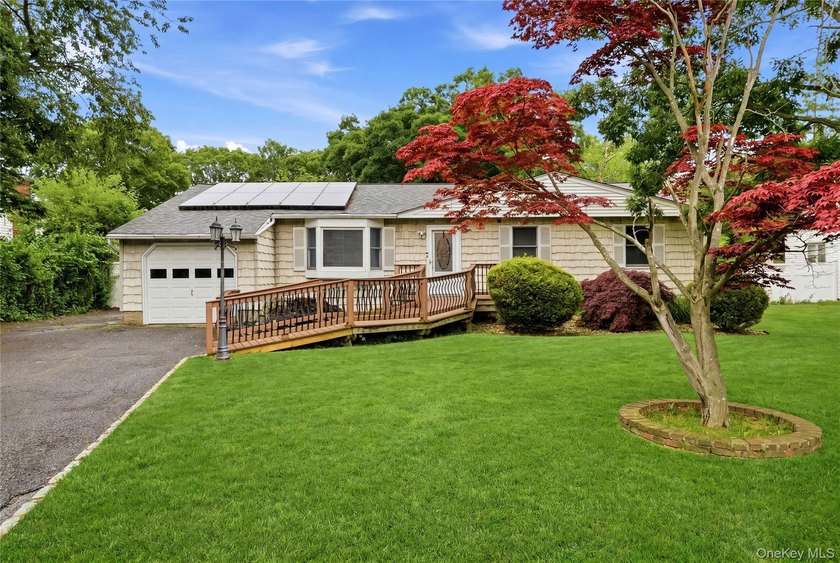 Located on a beautiful flat half-acre of property, this - photo 2