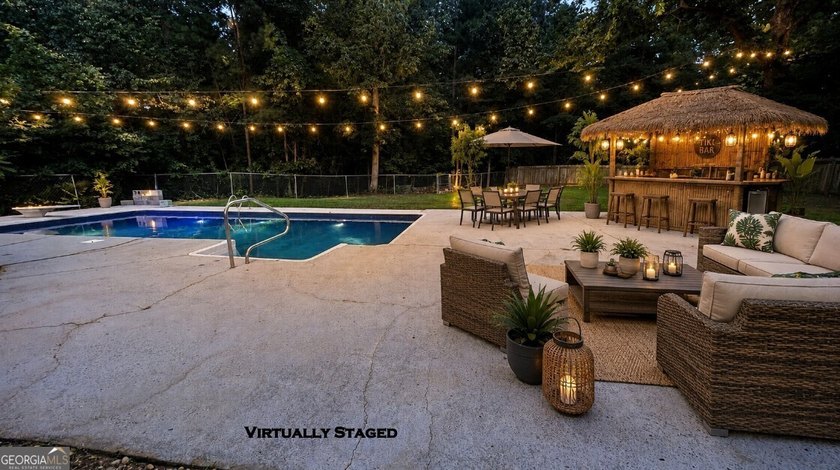 Welcome home to this stately 4-sided brick ranch tucked away on - photo 3