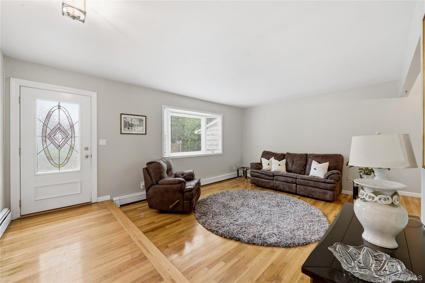 Located on a beautiful flat half-acre of property, this - photo 4