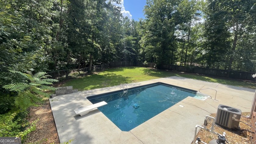 Welcome home to this stately 4-sided brick ranch tucked away on - photo 5