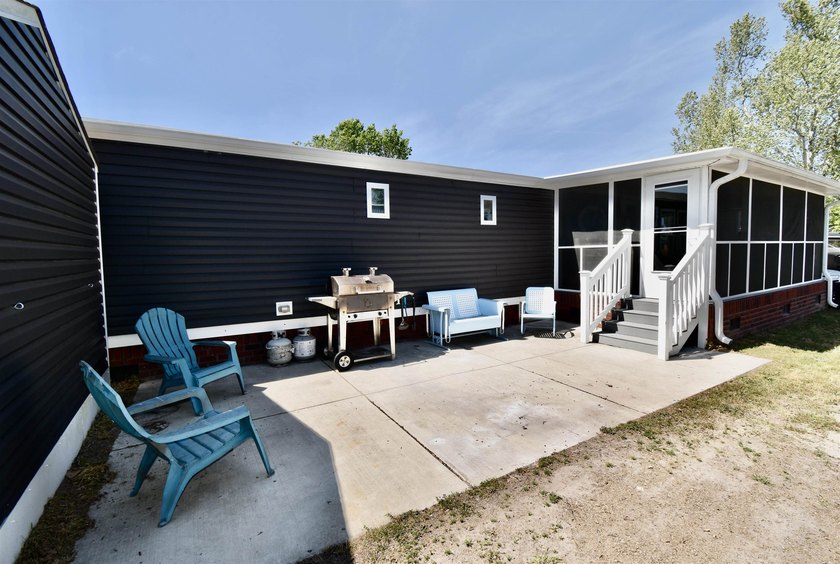 This charming 2-bedroom, 2-bath mobile home offers the perfect - photo 21