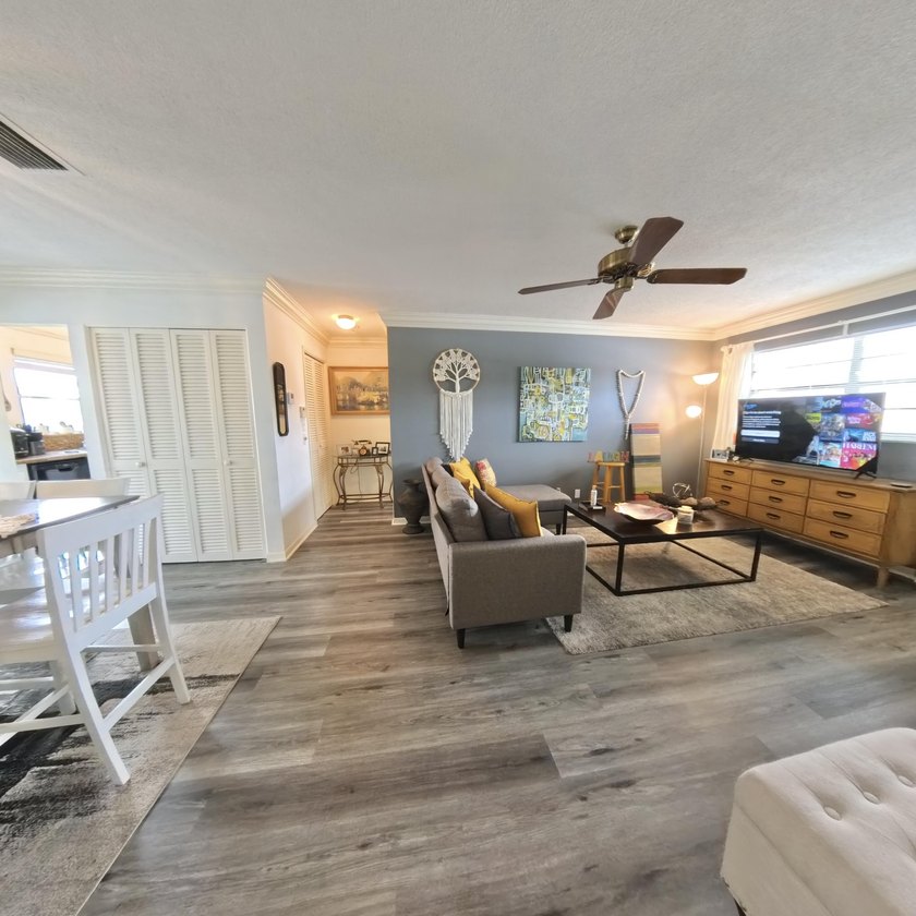 Step inside to find a spacious 2 bedroom condo featuring - photo 6