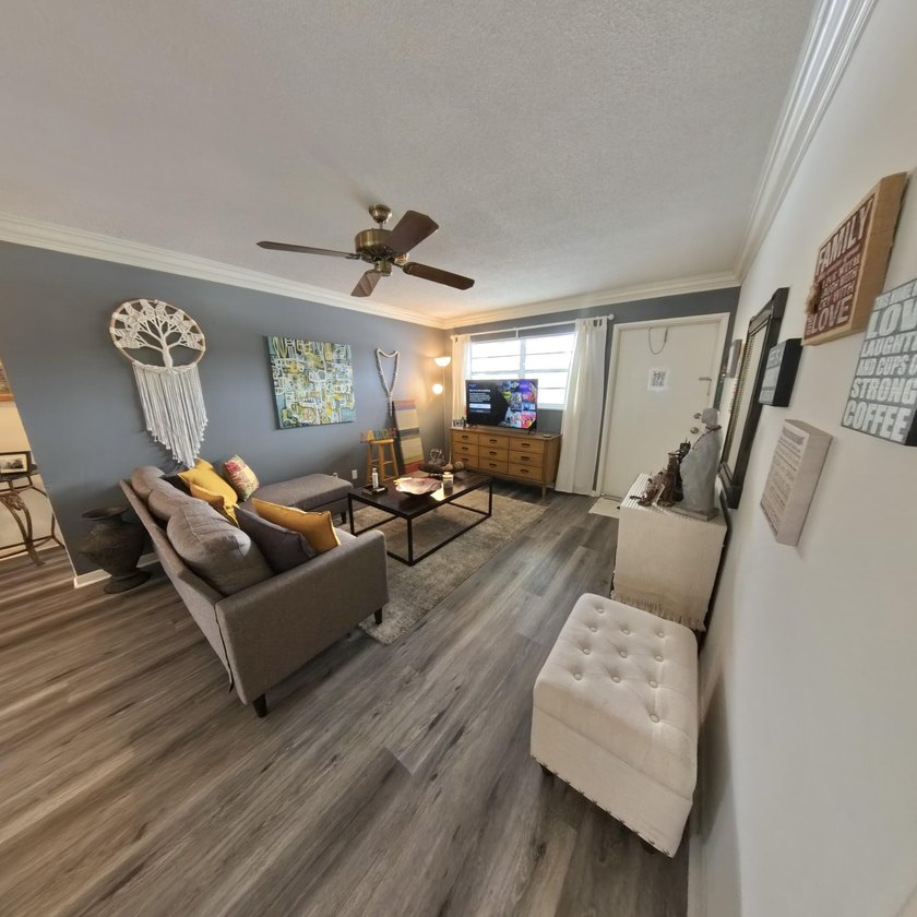 Step inside to find a spacious 2 bedroom condo featuring - photo 7