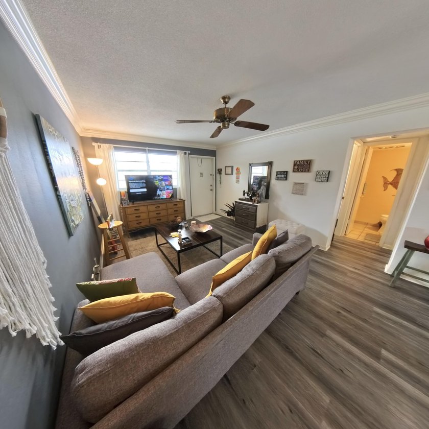 Step inside to find a spacious 2 bedroom condo featuring - photo 8