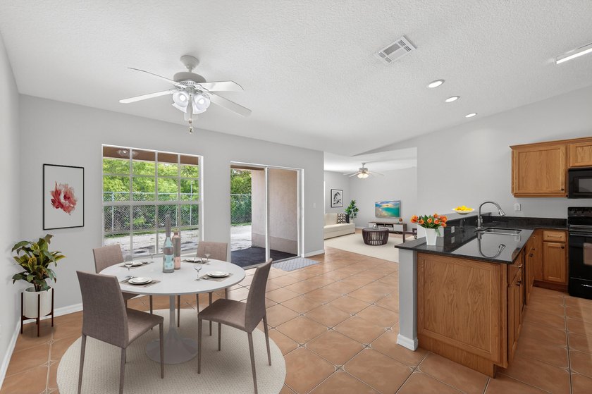 REDUCED! Welcome home to this 4 bedroom, 2 1/2 bath CBS home - photo 2