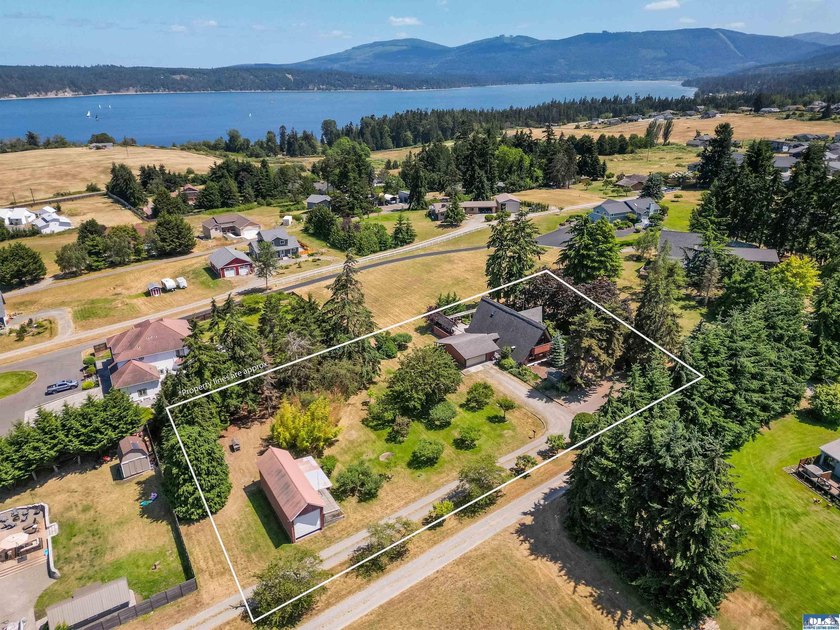 Nestled in the heart of sunny Sequim, this stunning A-frame home - photo 3