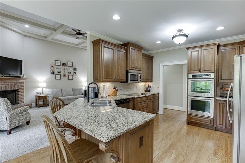 Nestled on a private one-acre homesite within the sought-after - photo 11