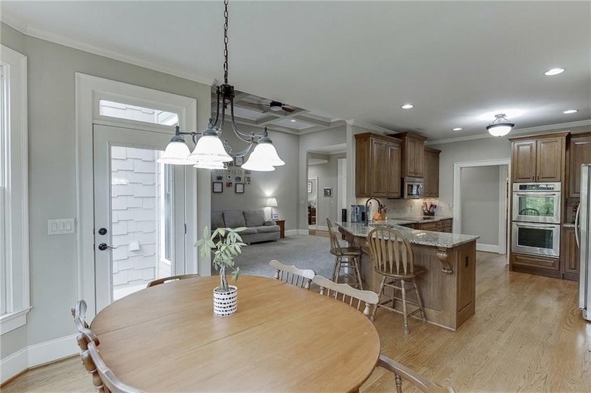 Nestled on a private one-acre homesite within the sought-after - photo 12