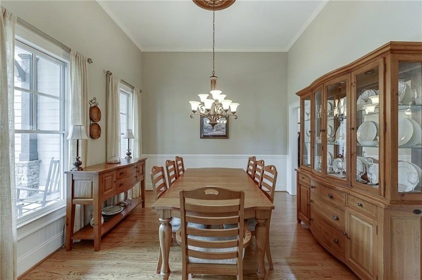 Nestled on a private one-acre homesite within the sought-after - photo 14