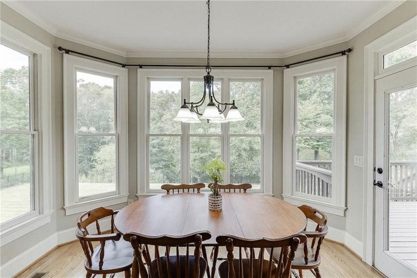 Nestled on a private one-acre homesite within the sought-after - photo 15