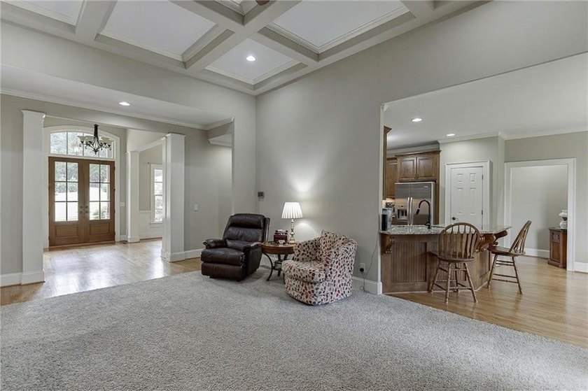 Nestled on a private one-acre homesite within the sought-after - photo 17