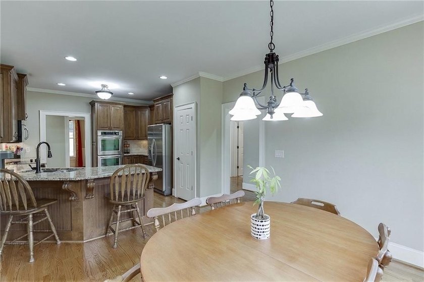 Nestled on a private one-acre homesite within the sought-after - photo 18