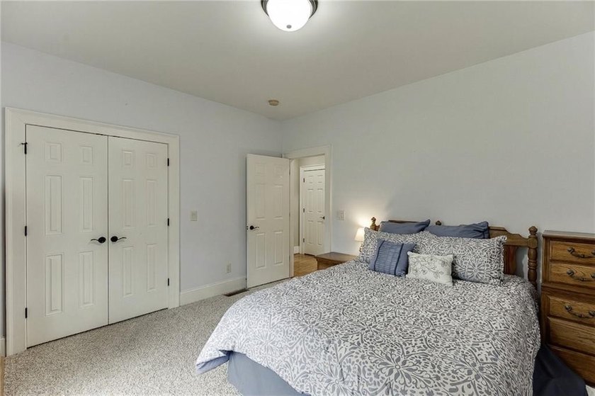 Nestled on a private one-acre homesite within the sought-after - photo 19