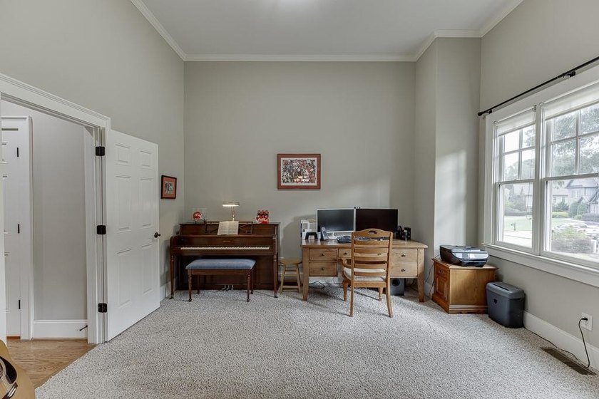 Nestled on a private one-acre homesite within the sought-after - photo 23