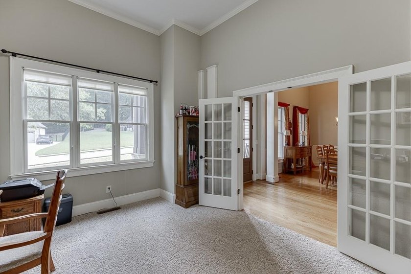 Nestled on a private one-acre homesite within the sought-after - photo 24