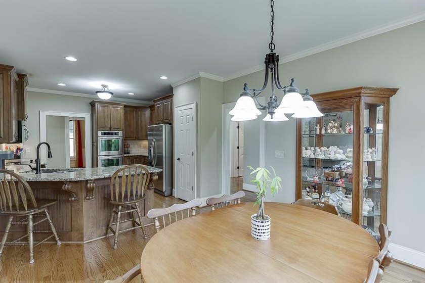 Nestled on a private one-acre homesite within the sought-after - photo 25