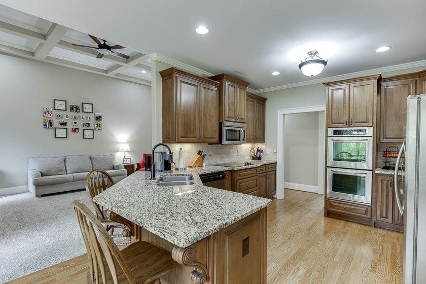 Nestled on a private one-acre homesite within the sought-after - photo 27