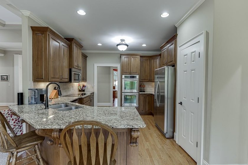 Nestled on a private one-acre homesite within the sought-after - photo 28