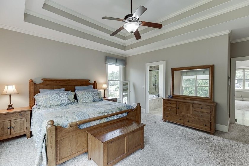 Nestled on a private one-acre homesite within the sought-after - photo 31