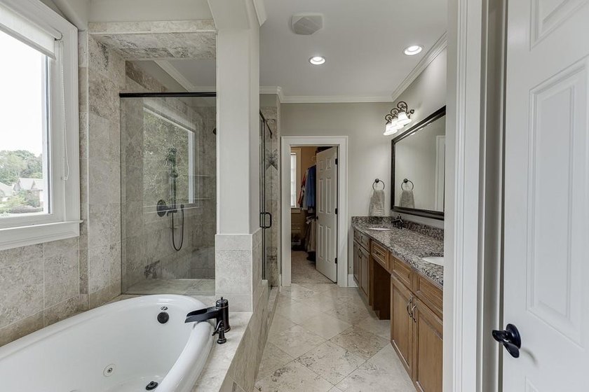 Nestled on a private one-acre homesite within the sought-after - photo 33