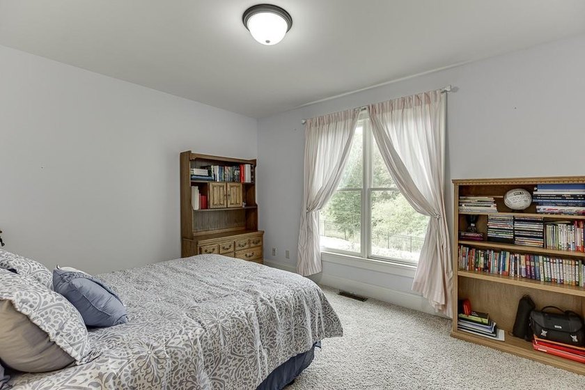 Nestled on a private one-acre homesite within the sought-after - photo 34